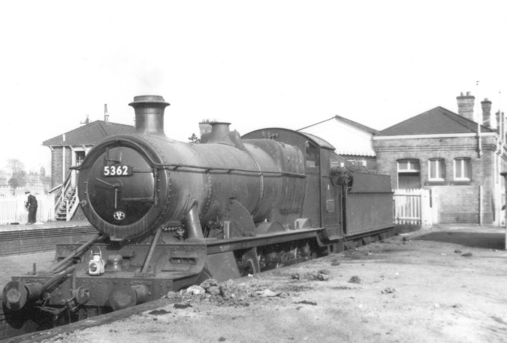 GWR 2-6-0 43xx class Mogul No 5362 carrying the head lamp code for a through train stands between duties in the Hatton Bank bay