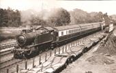 Ex-GWR 2-6-2T Large Prairie No 5163 is seen running bunker first at the head of a Snow Hill to Leamington local passenger service