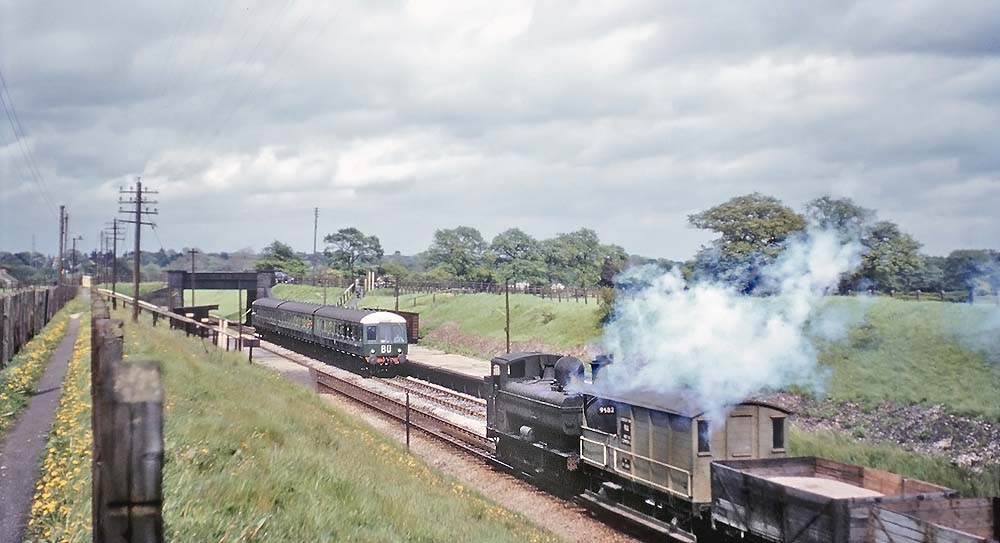 British Railways built 57xx Class 0-6-0PT No 9682 is seen in charge of a pick-up freight from Stratford upon Avon