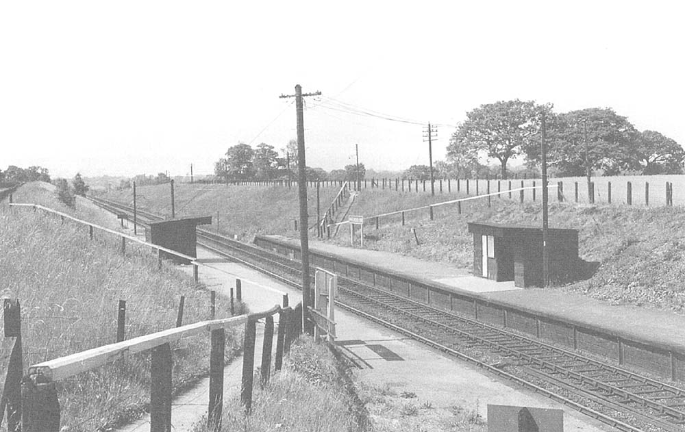 An elevated view of Whitlocks End Halt from the top of the path at Tilehouse Lane leading to the down platform