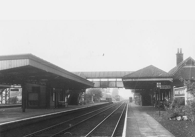 Looking towards Leamington along platform one with the signal box in the distance on 29th September 1960