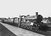 GWR 4-6-0 Saint class No 2914 'Saint Augustine' is seen at the head a local stopping train standing in the station