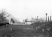 Looking towards Birmingham a view of the construction of the bridge over Widney Lane and work associated with the quadrupling of the line