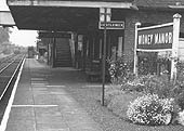 Close up view looking towards Leamington along the Up Main's No 1 platform with a DMU approaching on the Down Main line
