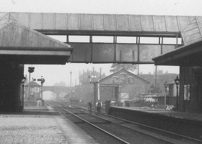 Close up of the goods shed and the signal box whilst a Permanent Way gang inspect the track