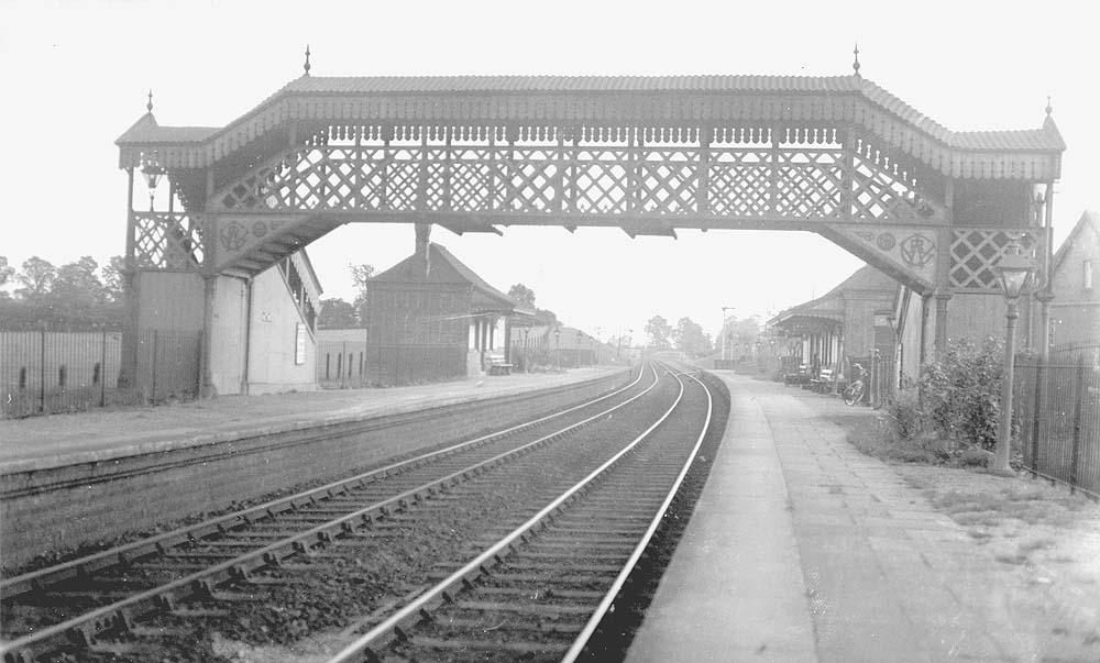 Looking towards Stratford upon Avon with the down platform on the left and in the distance on the right, the up refuge siding beyond the up platform