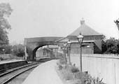 Close up showing the original 1860 station under the arch and the smaller down platform building with the gentlemens toilet nearest the camera