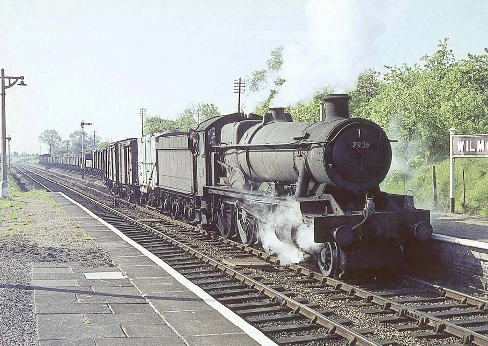 British Railways built 4-6-0 Modified Hall class No 7926 'Willey Hall' is seen emerging from the up refuge siding whilst at the head of a northbound freight train