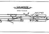 British Railways built 4-6-0 Modified Hall class No 7918 'Rhose Wood Hall' passes the original Wilmcote station whilst at the head of a down mineral train