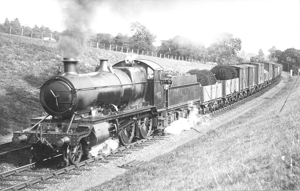 GWR 2-6-0 43xx class No 6386 approaches Wood End tunnel on a northbound Class B goods service