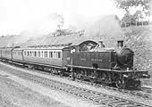 GWR 2-6-2T 3901 class No 3912 leaves Wood End tunnel on a Birmingham to Stratford local passenger service