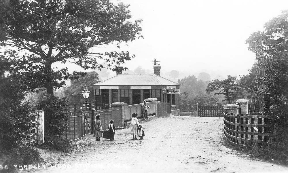 View looking in the direction of Trittiford Road showing Yardley Wood station's booking office built at road level on Highfield Road bridge