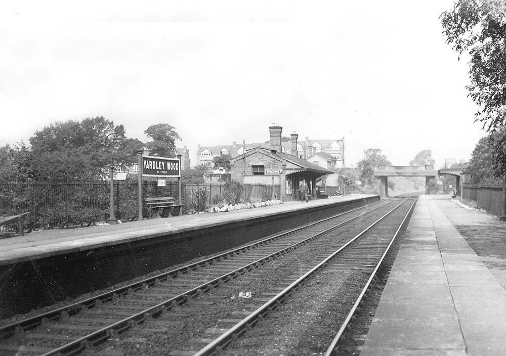 View of Yardley Wood Platform looking towards Birmingham with the up platform and buildings on the left and beyond the roadside booking office