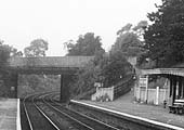 Close up showing the footpath from Highfield Road to the down platform which still retains its timber railings on the path and the GWR arrow head metal railings