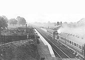 Looking towards Stratford upon Avon as an unidentified 'motor fitted' GWR 517 class 0-4-2T locomotive propels a 'push-pull' train from Yardley Wood