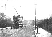 A very early view of new Albany Road with the bridge in the distance whilst an open top tram poses for the camera