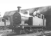 LMS 3F 0-6-0T No 7365 stands in steam above the service pits in front of the shed on 24th August 1935