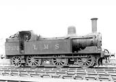 Ex-LNWR 2F 0-6-2T No 27575 has just run bunker first from the coaling plant before it poses before the camera