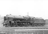 LMS 6P 4-6-0 Royal Scot class No 6164 'The Artists Rifleman' stands adjacent to the main lines on 2nd July 1938
