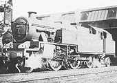 LMS 4P 2-6-4T No 2611 is seen with safety valves lifting alongside the Ash Plant and in front of the shed in 1938