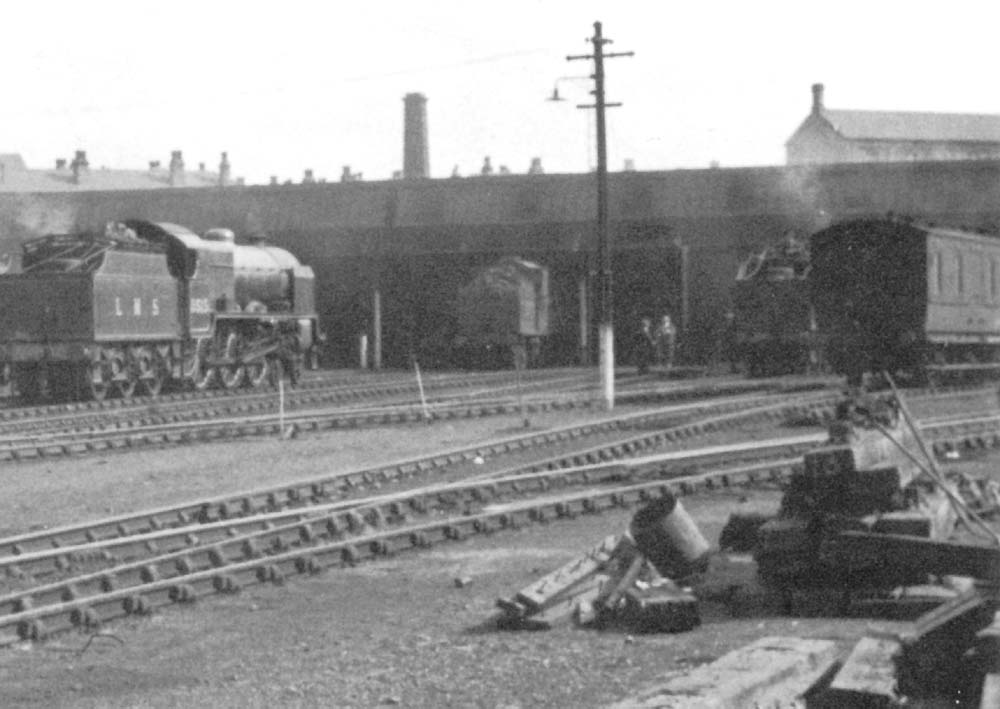 Close up of LMS 4-6-0 Patriot class No 5515 'Caernarvon' and an unidentified tank and tender locomotive