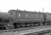 Ex-LNWR six wheel Full Brake coach, M284609, is seen stabled at Aston shed on 4th July 1957