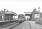 Looking north towards Nuneaton as a DMU local passenger service to Leamington Avenue stops in the station