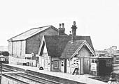 Close up showing Bedworth station's goods yard and sidings together with various other buildings located to the side of the station