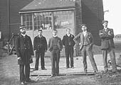 Bedworth Station Goods Shed staff pose in front of the dispatch office which 'leant' against the goods shed wall