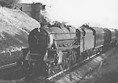 Ex-LMS 5MT 4-6-0 No 44938 heads a passenger express through Bedworth on Friday 3rd May 1963