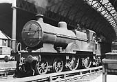 Ex-MR 2P 4-4-0 No 40511 is seen on pilot duties whilst standing on the middle road between Platforms 10 and 11 at the West end of New Street