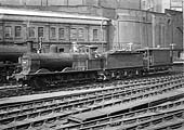 Ex-Midland Railway 2F 0-6-0 No 3168 is seen traversing between Platforms 1 and 2 with an ex-Midland  20 ton brake van behind its tender