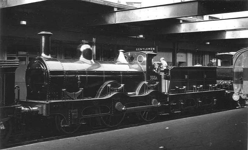 Ex-LMS 5P4F 2-6-0 'Crab' No 2764 is seen passing under Worcester Street bridge with the tunnel seen in the distance, as it enters New Street station