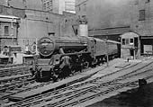 Ex-LMS 5MT 4-6-0 No 45419 is seen passing Signal Box No 2 as it arrives at Platform 6 on a down express service from Rugby