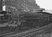 British Railways Class 7 4-6-2 No 70044 'Earl Haig' is seen standing at the West end of Platform 5 with a down passenger service