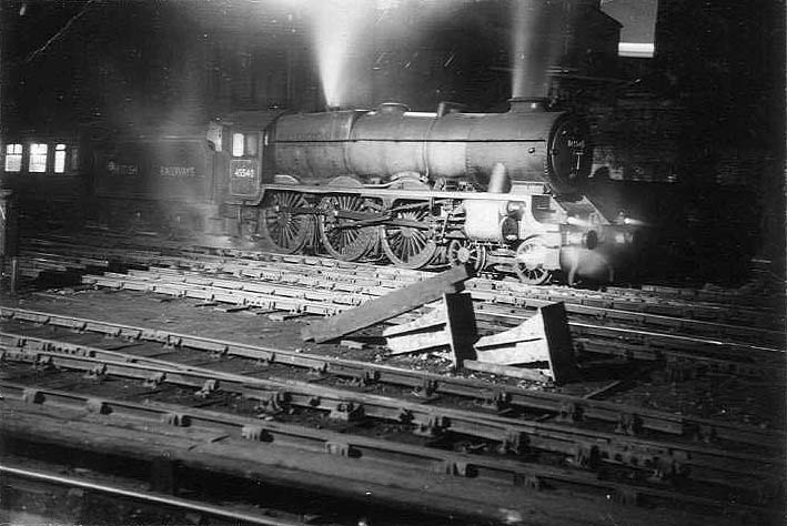  Ex-LMS 5XP 4-6-0 Rebuilt Patriot class No 45540 'Sir Robert Turnball' is seen about to pass under Hill Street bridge with a Wolverhampton express