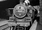 Ex-LMS 4MT 2-6-4T No 42345 is seen passing under Navigation Street bridge as it arrives at Platform 1 with a local passenger service 