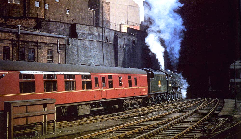 Ex-LMS 5XP 4-6-0 No 45647 'Sturdee' is seen about to enter Worcester Street tunnel at the head of the up 'Midlander' to Euston