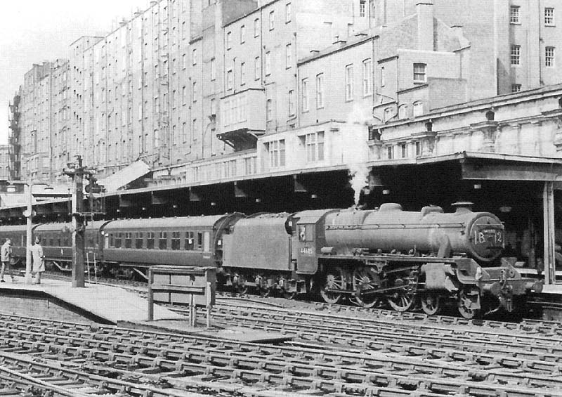 British Railways built 'Black 5' 4-6-0 No 44685 stands at the East end of Platform 3 with a New Street to Euston express passenger service