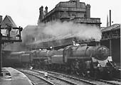 British Railways Standard Class 4 4-6-0 No 75009 pilots British Railways Class 5 4-6-0 No 73016 arrives at Platform 10 on the 8 am service from Newcastle