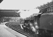 Ex-LMS 5MT 4-6-0 No 45369 is seen standing on the middle road between Platforms 9 and 10  facing West during the demolition of the roof