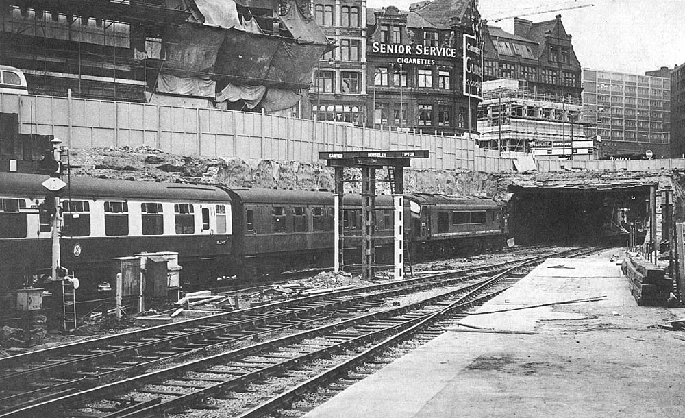 British Railways Type 4 1Co-Co1 D125 is seen departing Platform 9 on a New Street to Cardiff express service on Thursday 30th July 1964