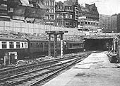 British Railways Type 4 1Co-Co1 D125 is seen departing Platform 9 on a New Street to Cardiff express service on Thursday 30th July 1964