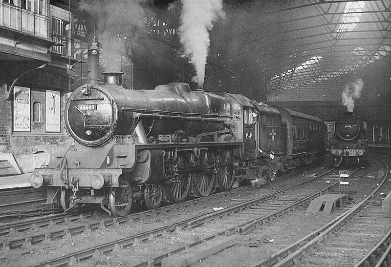 Ex-LMS 5XP Jubilee class No 45649 'Hawkins' is seen standing at the West end of Platform 9 with the 6 37pm service to Worcester