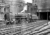 British Railways Type 4 1-Co-Co1 D94 is seen standing at Platform 9 ready to depart with the 12 52pm York to Bristol express on 8th June 1961