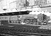 British Railways Type 4 1-Co-Co1 D94 is seen standing at Platform 9 ready to depart with the 12 52pm York to Bristol express on 8th June 1961