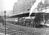 British Railways Standard Class 7MT 4-6-2 No 70031 'Byron' is about to depart platform 3 with an up express on 20th April 1955