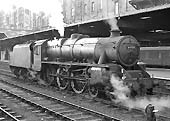 Ex-LMS 5MT 4-6-0 No 44938 is seen standing between platforms 3 and 4 on 14th September 1962