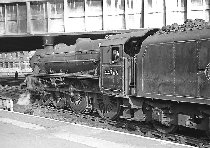 Ex-LMS 5MT 4-6-0 No 44906 is seen departing from platform 3 with an up express on 29th June 1963