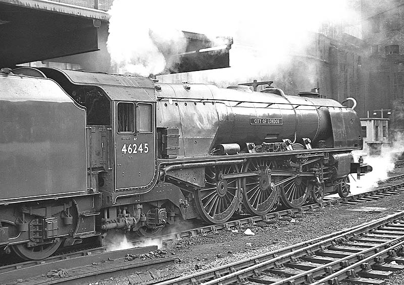 Ex-LMS 8P Coronation Class 4-6-2 No 46245 'City of London' departs platform 3 with an up express service to Euston on 22nd August 1963